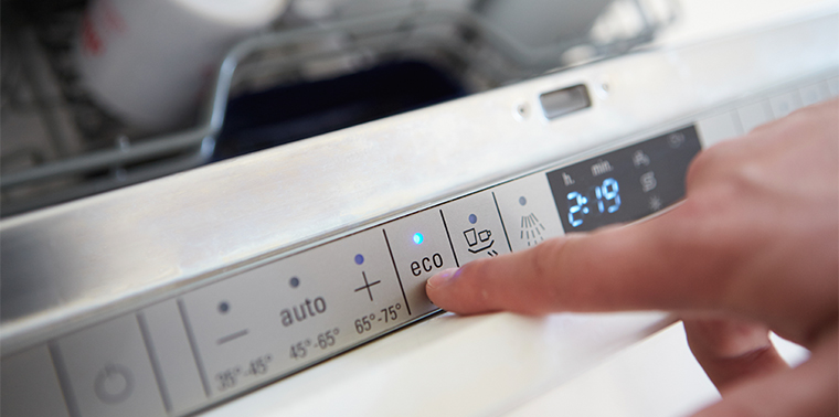 Eco mode button on dishwasher